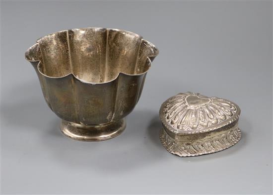 An Edwardian silver sugar bowl and a late Victorian heart shaped silver box by William Comyns.